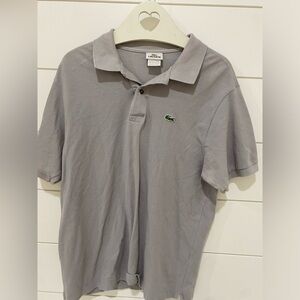 Men’s Lacoste polo shirt.